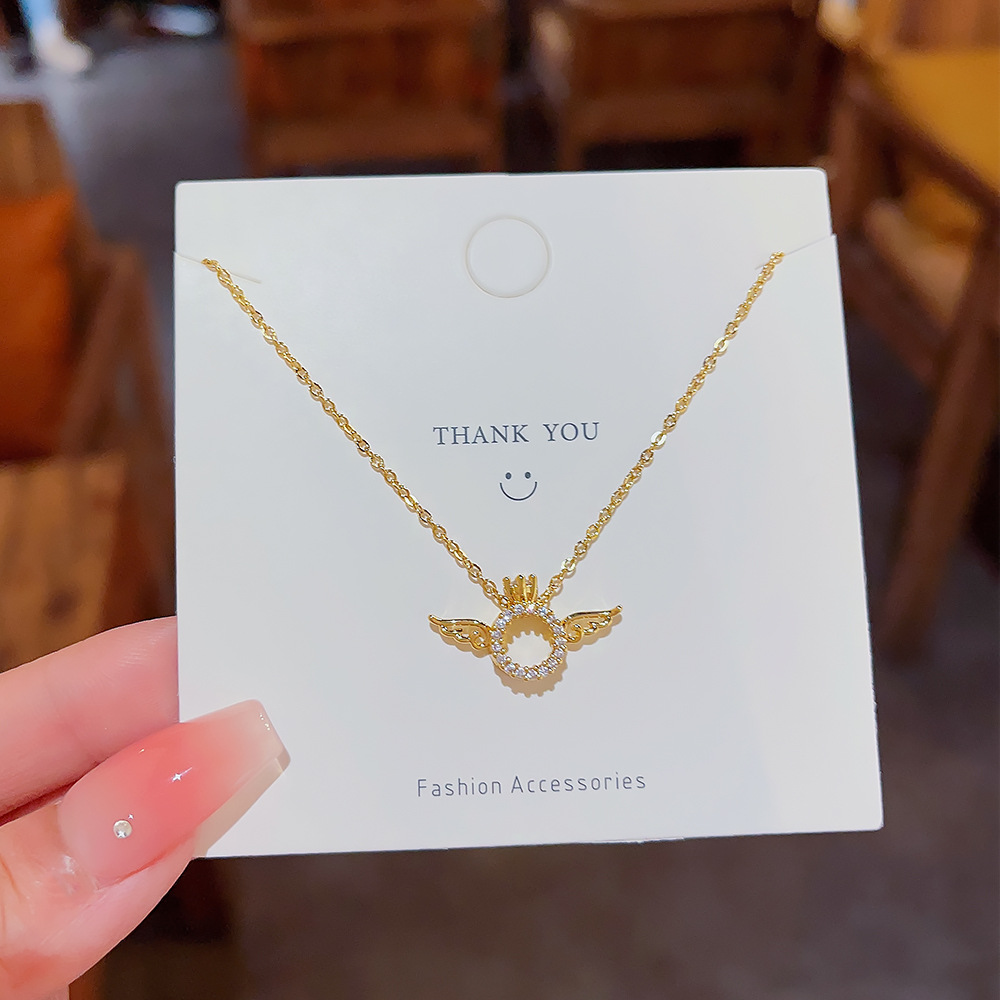 Little Angel micro-inlay pendant titanium steel necklace, a simple and elegant female Instagram style, a popular collarbone chain, a personalized and versatile necklace full figure