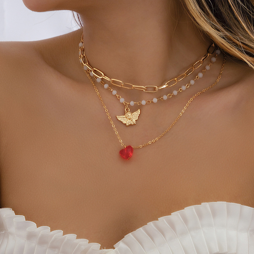 European and American layered style retro little angel pendant, versatile collarbone chain, elegant and fashionable imitation crystal heart-shaped necklace for women full figure