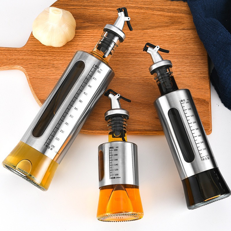 Household kitchen stainless steel glass oil bottle, leak-proof press-type olive oil pot, soy sauce and vinegar seasoning bottle Application Scenario