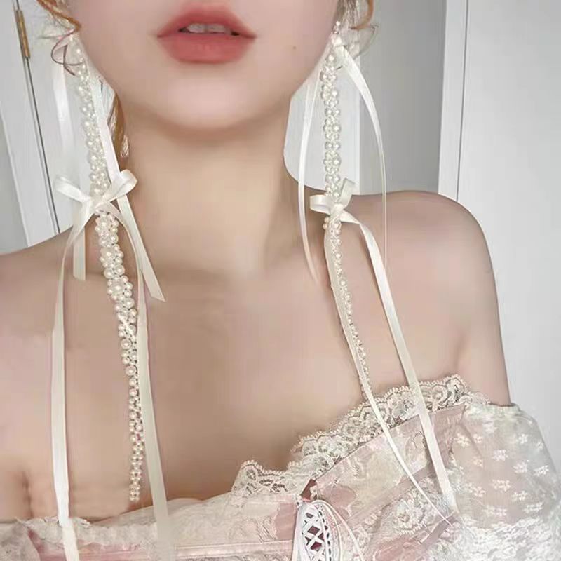 French laid-back white ribbon long tassel earrings, ballet face-enhancing small earrings, spring new style, unique and exaggerated Application Scenario