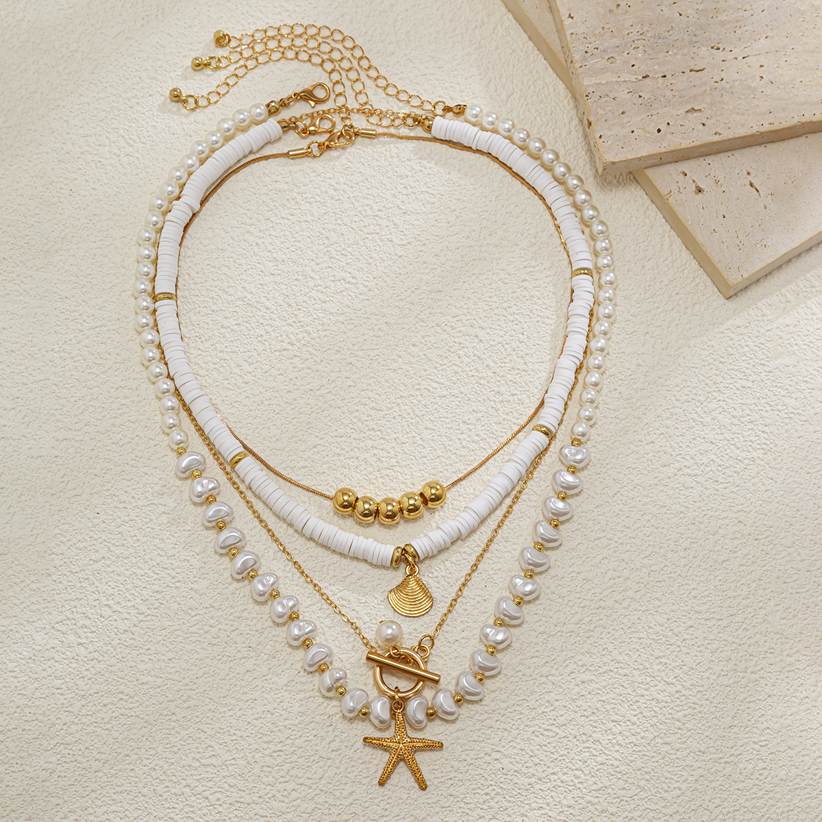 European and American cross-border jewelry, ins starfish imitation pearl necklace set, niche alloy irregular multi-layer collarbone chain Application Scenario