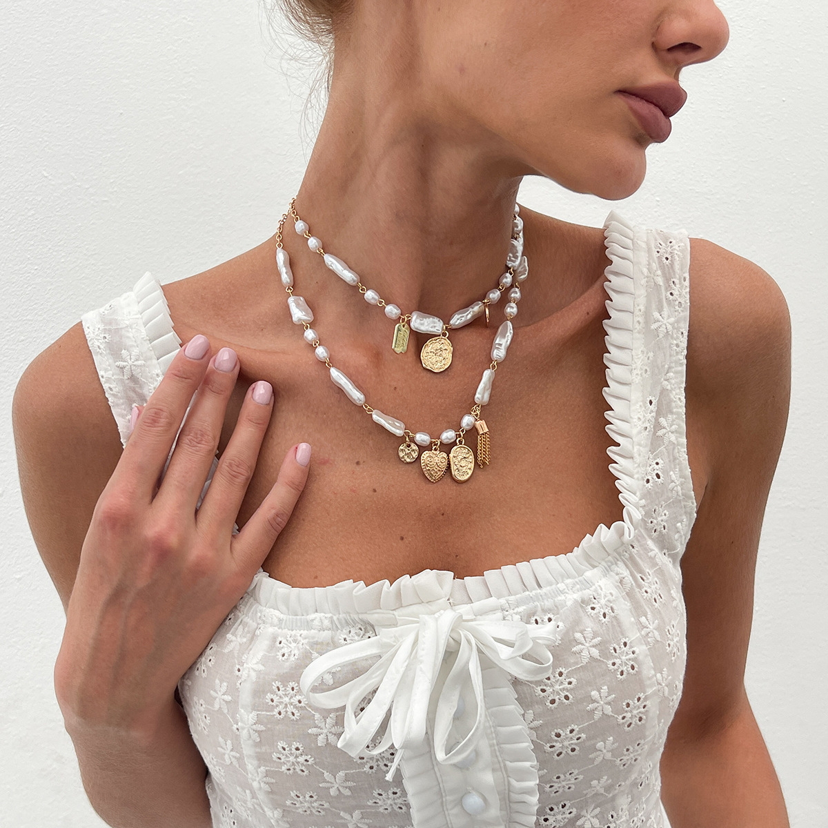 European and American cross-border jewelry design sense, irregular-shaped pearl cross chain necklace, layered heart-shaped metal pendant necklace for women details Picture