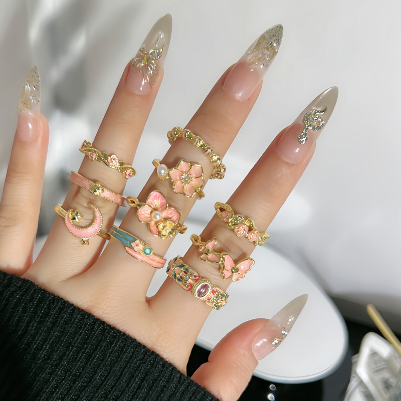 Korean sweet pink enamel flower drop glaze elegant open ring, a fashionable and niche design sense light luxury ring for women full figure