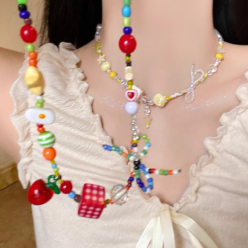 Yellow bow star-shaped collarbone chain, cute and childlike beaded necklace, light luxury, versatile and niche necklace full figure