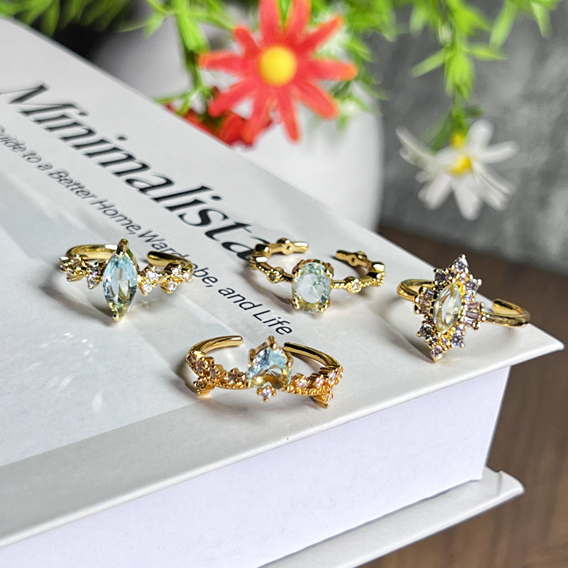 The high-end and trendy sea blue zirconium oval pigeon egg blue ring is exquisite and versatile for women. It can be worn in layers and exudes a geometric charm Application Scenario