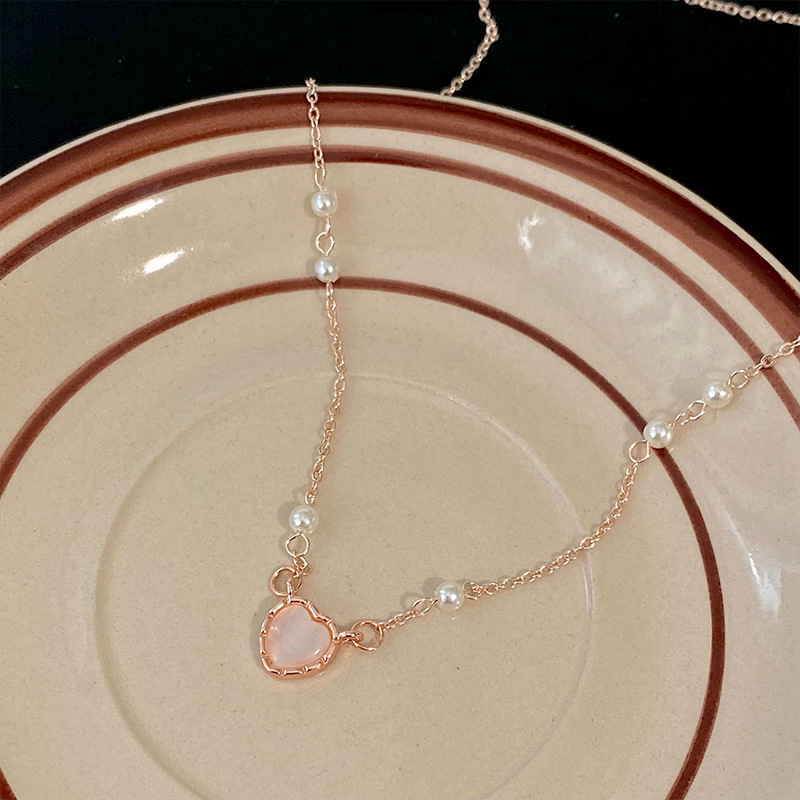 Cold style cat's eye heart-shaped necklace for women, light luxury and niche design sense, small pearl collarbone chain accessory necklace wholesale Specification drawing