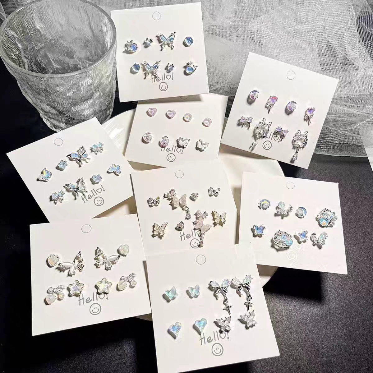 4 pairs of small and exquisite earrings, sweet, niche and simple new stud designs, elegant and versatile butterfly earrings full figure