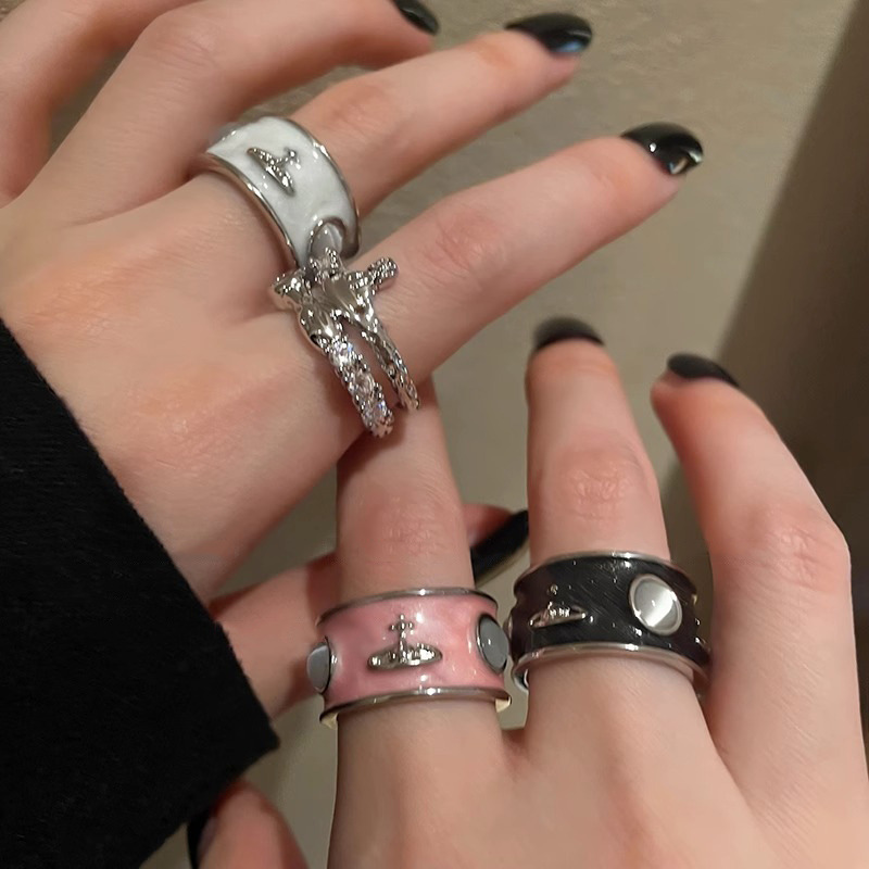 The Western Empress Planet drip glaze open ring is a niche design for women, exuding a sense of sophistication and elegance. It is a fashionable and individual couple's ring details Picture