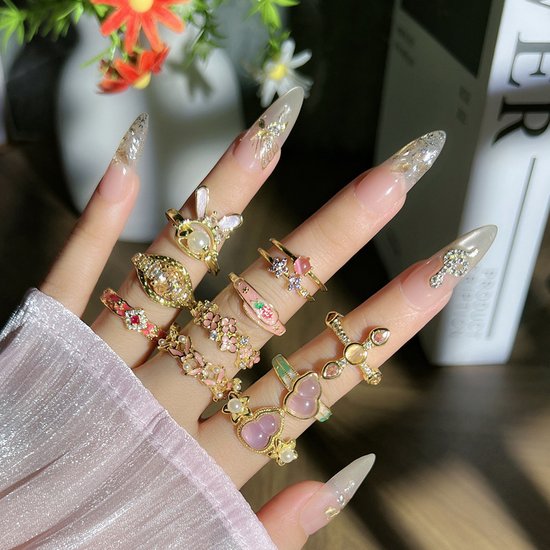 A trendy new Chinese-style gourd-shaped pink flower enamel sweet and cool ring with a cold and elegant female butterfly style full figure