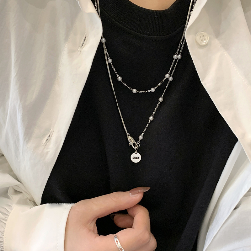 Double-layered pearl sweater chain for women's 2023 new trendy spring and summer design, a niche necklace accessory full figure
