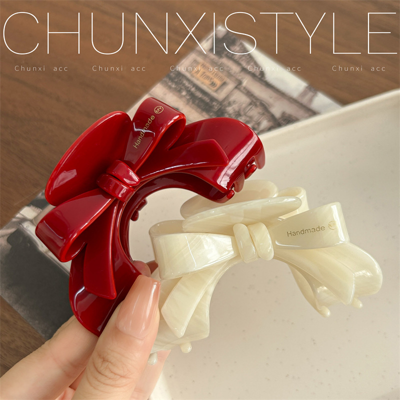 French high-end bow acetate clip, elegant and refined hair clip, arched updo, shark clip, women's hair accessory, hair clip Application Scenario