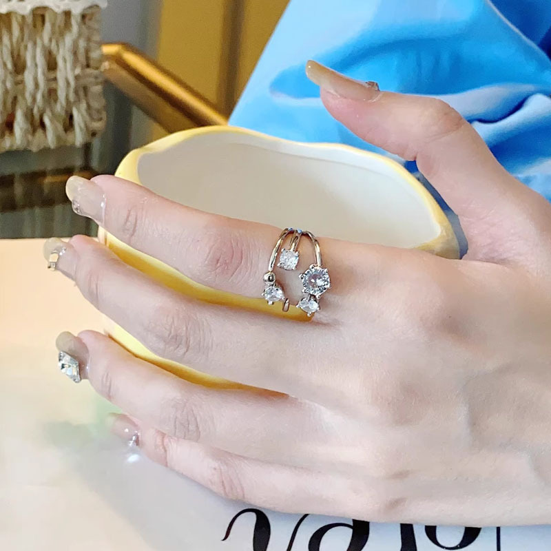 This is a unique French light luxury zircon fashion and personality ring designed for women. It has a cold and elegant style and a high-end feel. It's an index ring details Picture