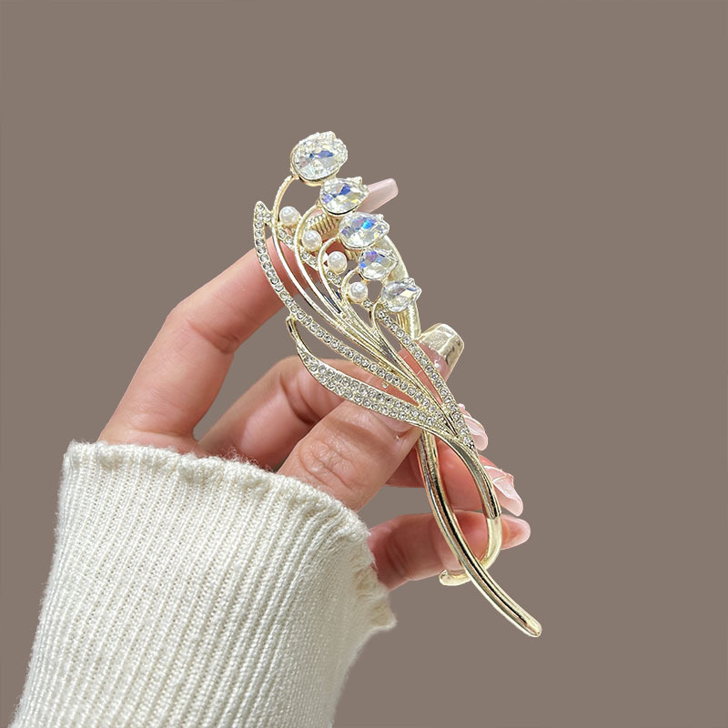 High-end lily of the valley twist clip, niche one-line clip, updo hairpin, frog buckle, and female headwear at the back of the head Specification drawing