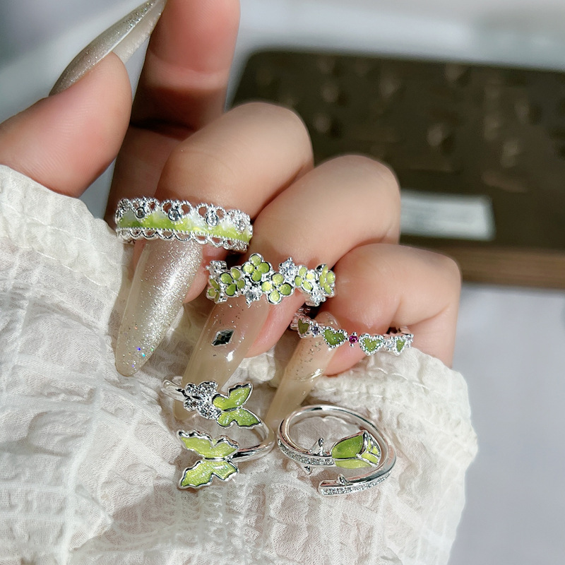 The "Flower Bloom" series features a fresh and delicate design with a light green, sweet and exquisite open ring, a butterfly flower ring for women full figure