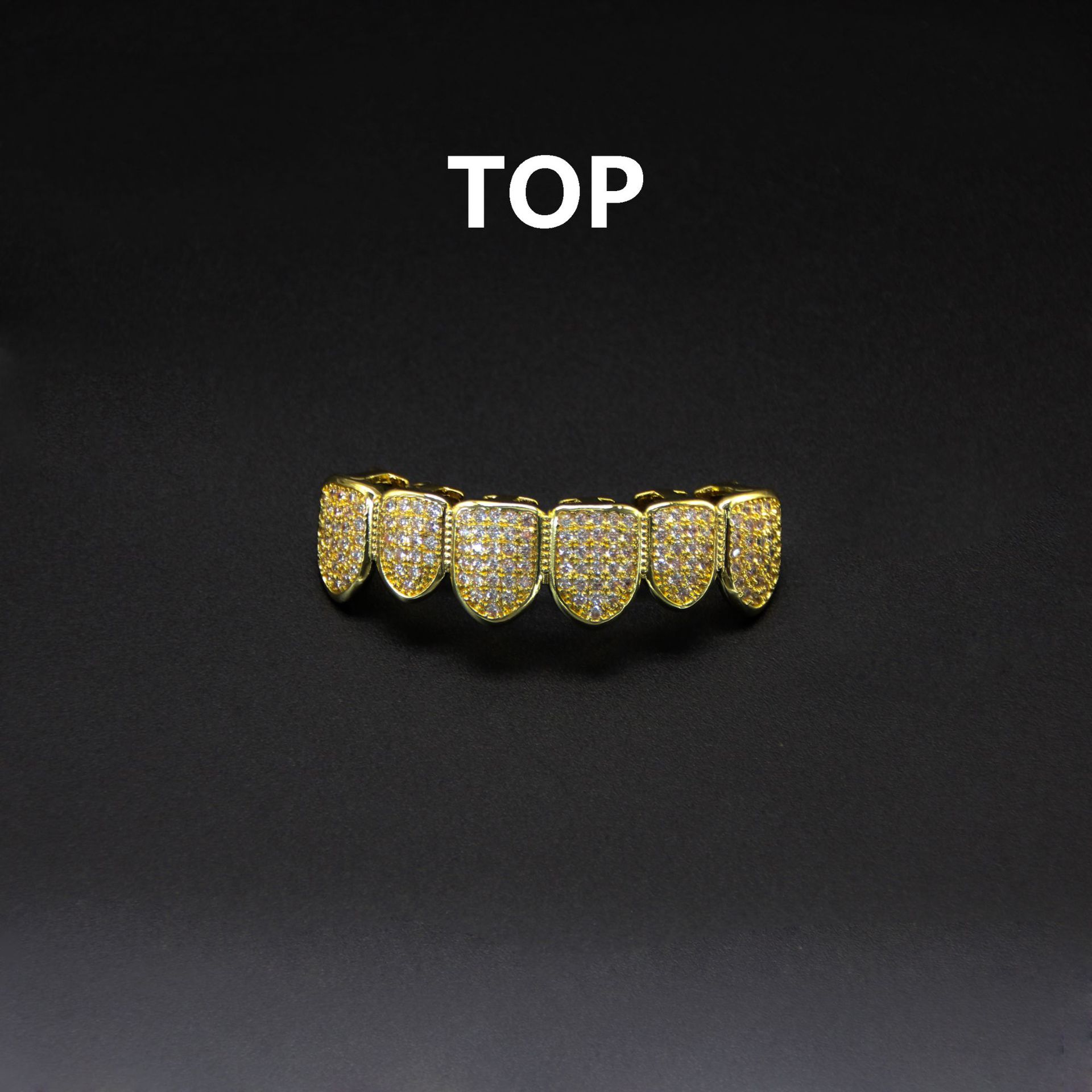 TEMU's full zirconium-plated real gold zircon braces are selling well. Wholesale of the Halloween bestseller vampire sharp teeth hip-hop braces Application Scenario