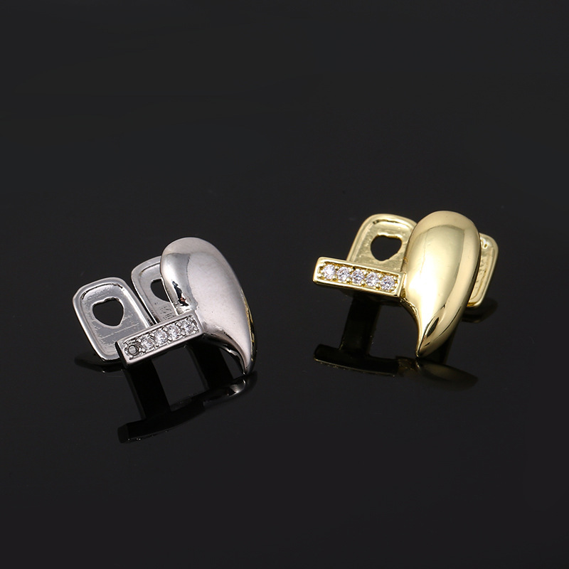A new type of cross-border hip-hop accessory for men, featuring single sharp teeth zircon braces with horizontal bars and personalized dentures, is selling well in Europe and America details Picture