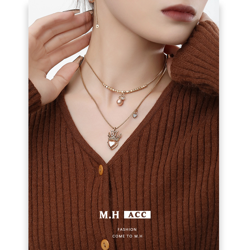 Double-layer layered necklace with a high-end, light luxury and niche crown heart-shaped collarbone chain, ins original style antique matte gold pendant details Picture