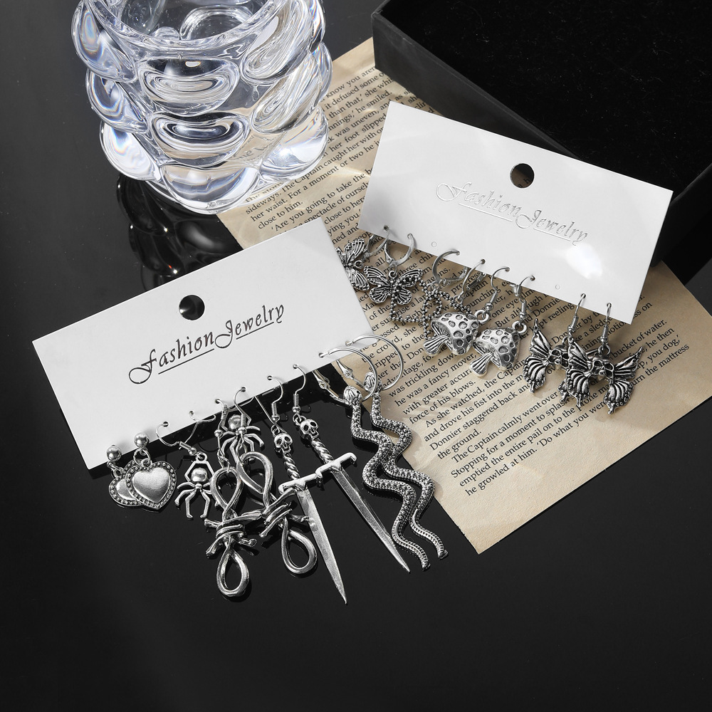 European and American Instagram heart-shaped butterfly earrings set for women, retro and creative snake-shaped sword mushroom earrings, Halloween earrings Application Scenario