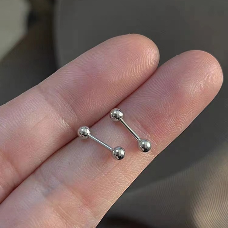 Titanium steel screw snap ear bone nails are small, versatile, and personalized. They are simple and cold style earrings that are popular online accessories full figure