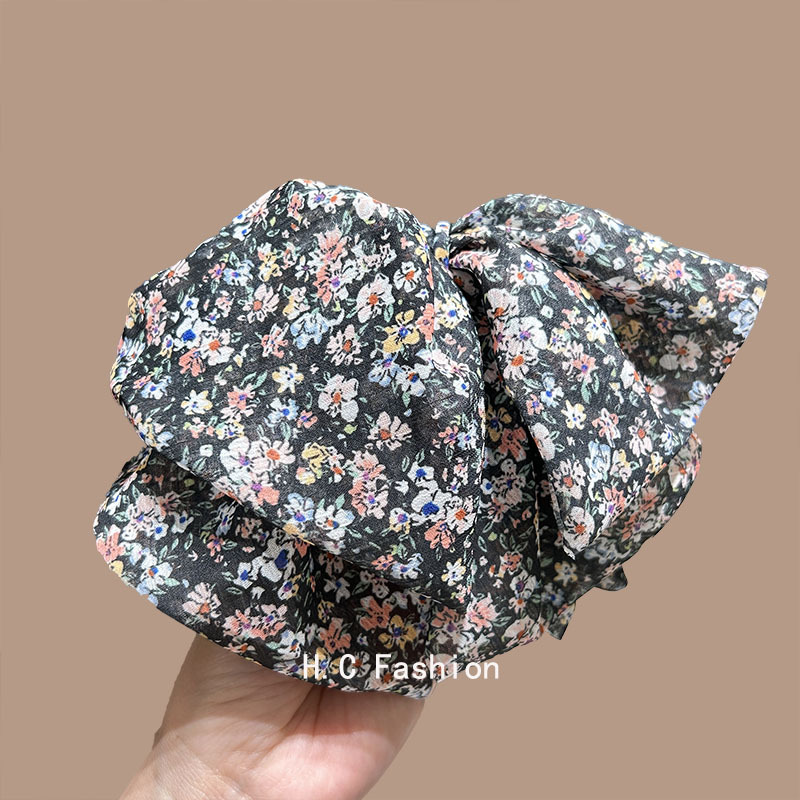 Korean sweet floral large bow clip for women, elegant and stylish ponytail clip, versatile hairpin for the back of the head details Picture