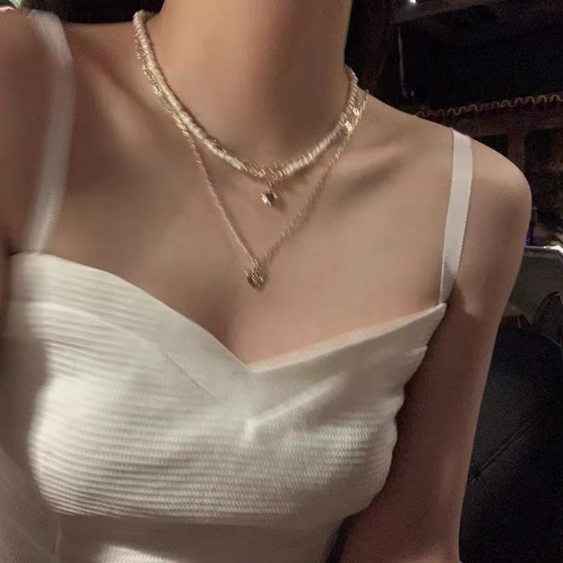 Three-layer pearl heart-shaped necklace for women's summer, with a light luxury and niche design sense collarbone chain, retro ins neck chain Specification drawing