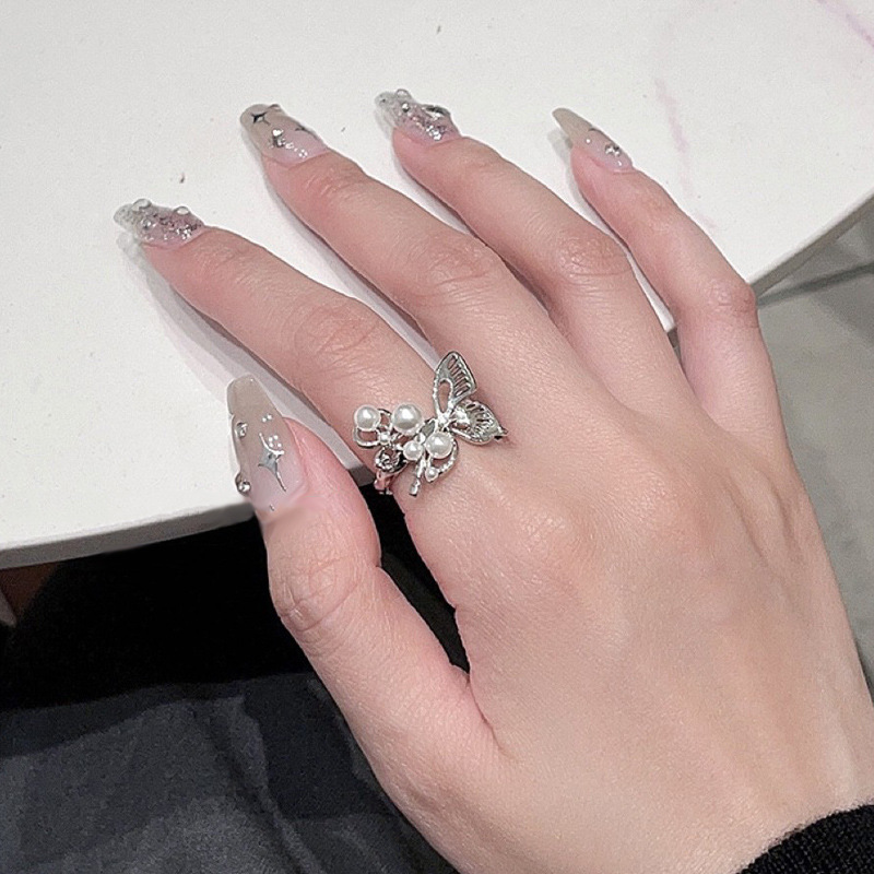 Exquisite and unique butterfly pearl hollowed-out open ring, versatile open ring for women on Instagram, cold style, niche and elegant index finger ring trend details Picture