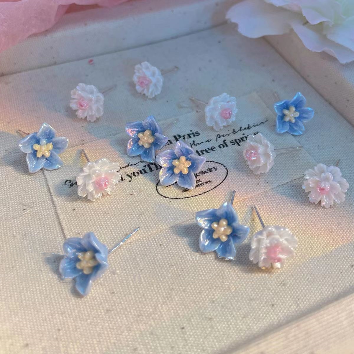 The new blue camellia stud earrings for women in the summer of 2025 are a trendy Korean-style, elegant and sweet girl's delicate and small earrings Application Scenario