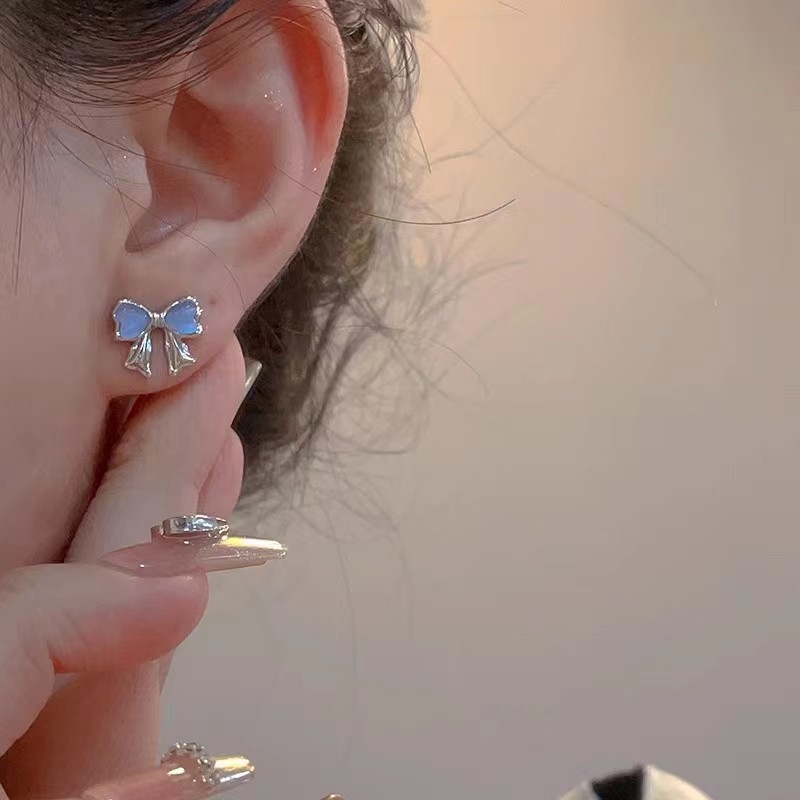 Mini, fresh and cute blue cat's eye stone bow stud earrings for women 2025 new bestsellers, fashionable and versatile earrings details Picture