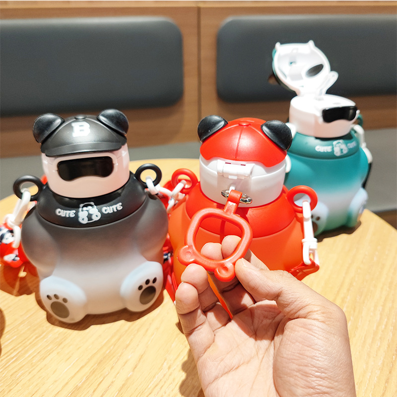 E-commerce wholesale new children's cute water cups with high appearance level, featuring straws, carrying straps, water bottles, portable and direct drinking bear water cups details Picture