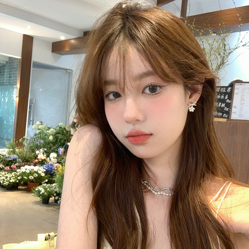 Niche design sense, high-end bow pearl flower earrings, women's summer light luxury stud earrings, 2025 new trend Application Scenario