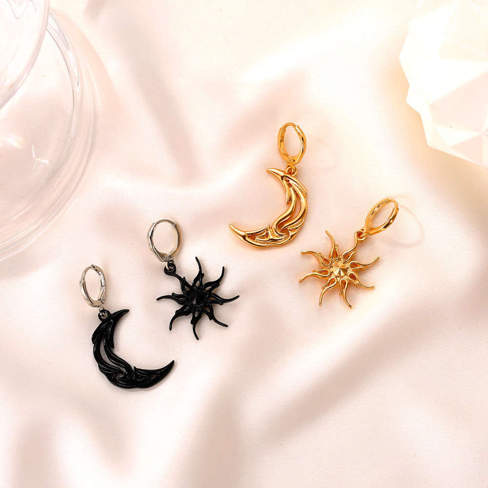 New cross-border minimalist sun and moon earrings, personalized asymmetrical abstract earrings, short hollowed-out star and moon ear buckles full figure