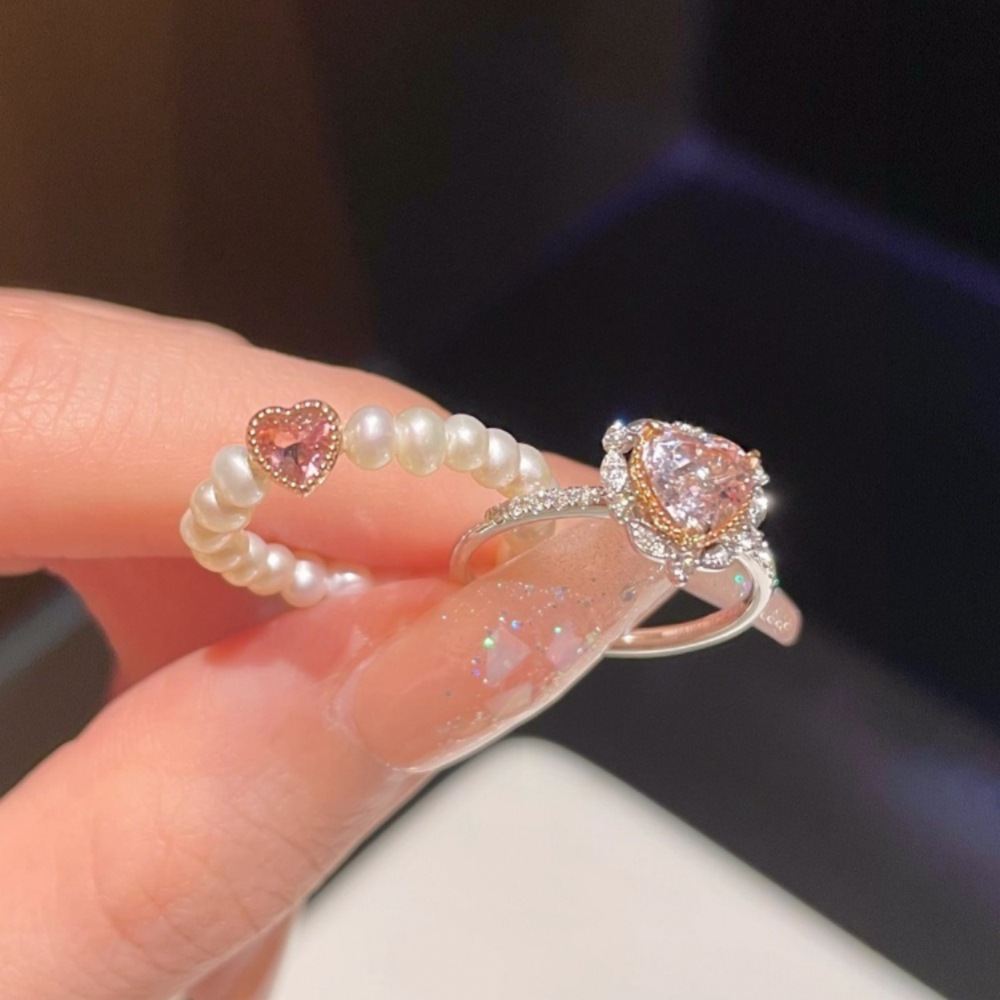 A pink heart-shaped zircon pearl ring for a runaway princess, a rare and high-end index finger ring for women, with a sweet and versatile temperament full figure