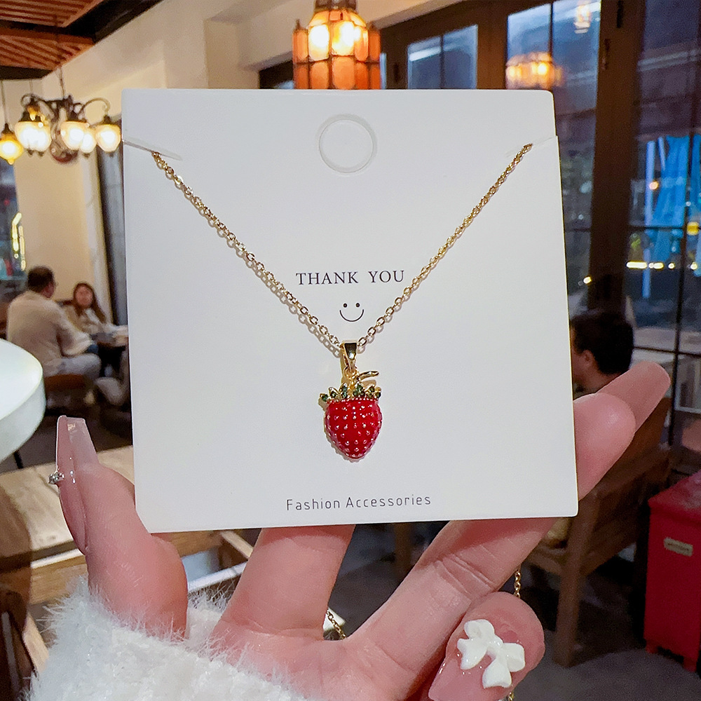 Cute and sweet strawberry titanium steel necklace pendant, girlish and fresh, niche design sense collarbone chain, versatile necklace Application Scenario