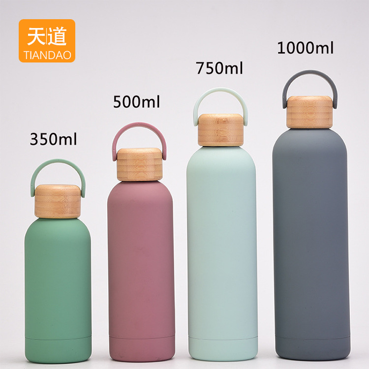 Wholesale of large-capacity vacuum 304 stainless steel insulated cups, outdoor portable sports water bottles, hand-held mountain climbing and travel water bottles details Picture