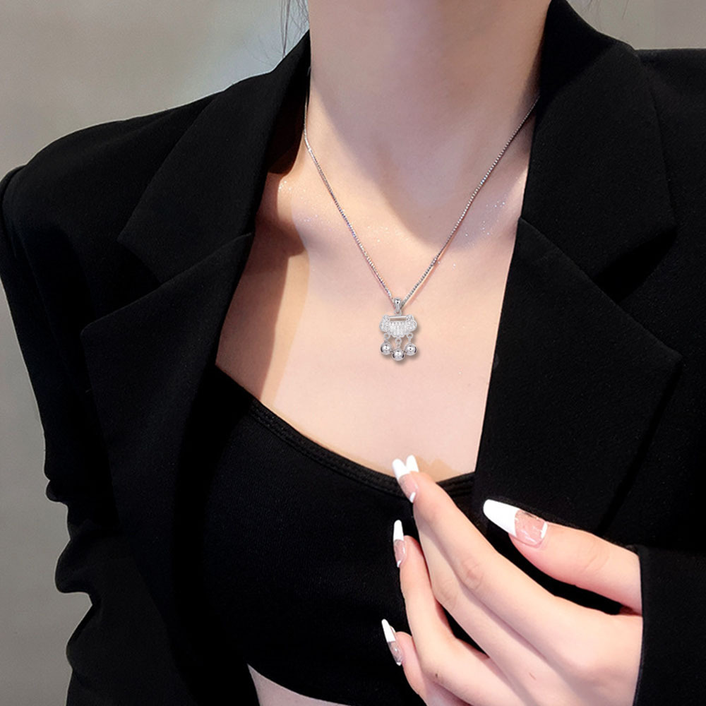 Ethnic-style ruyi peace Lock bell pendant necklace, a new niche women's collarbone chain, light luxury and simple necklace wholesale Application Scenario