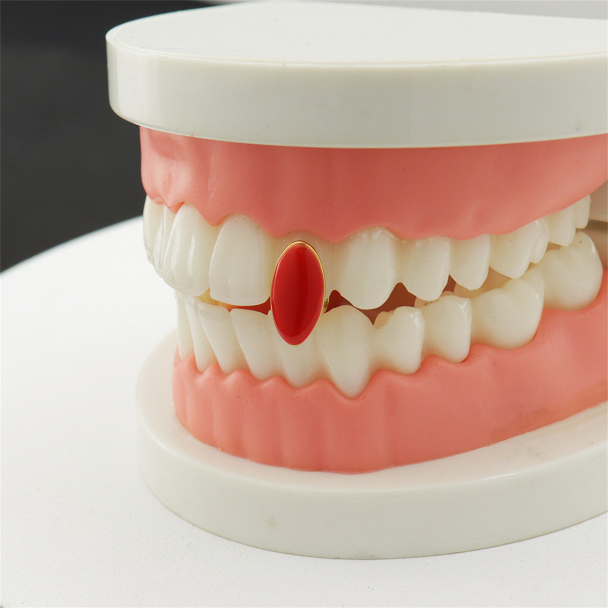 Single 18K gold-plated color red oil-dripping hip-hop braces Grills male and female vampire sharp teeth cross-border trade full figure