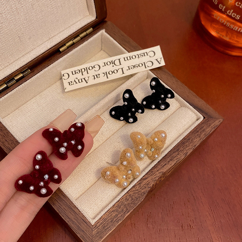 S925 Silver Needle Autumn/Winter New flocked butterfly Earrings, a high-end women's earring with wine red pearl stud earrings, a best-selling accessory Application Scenario