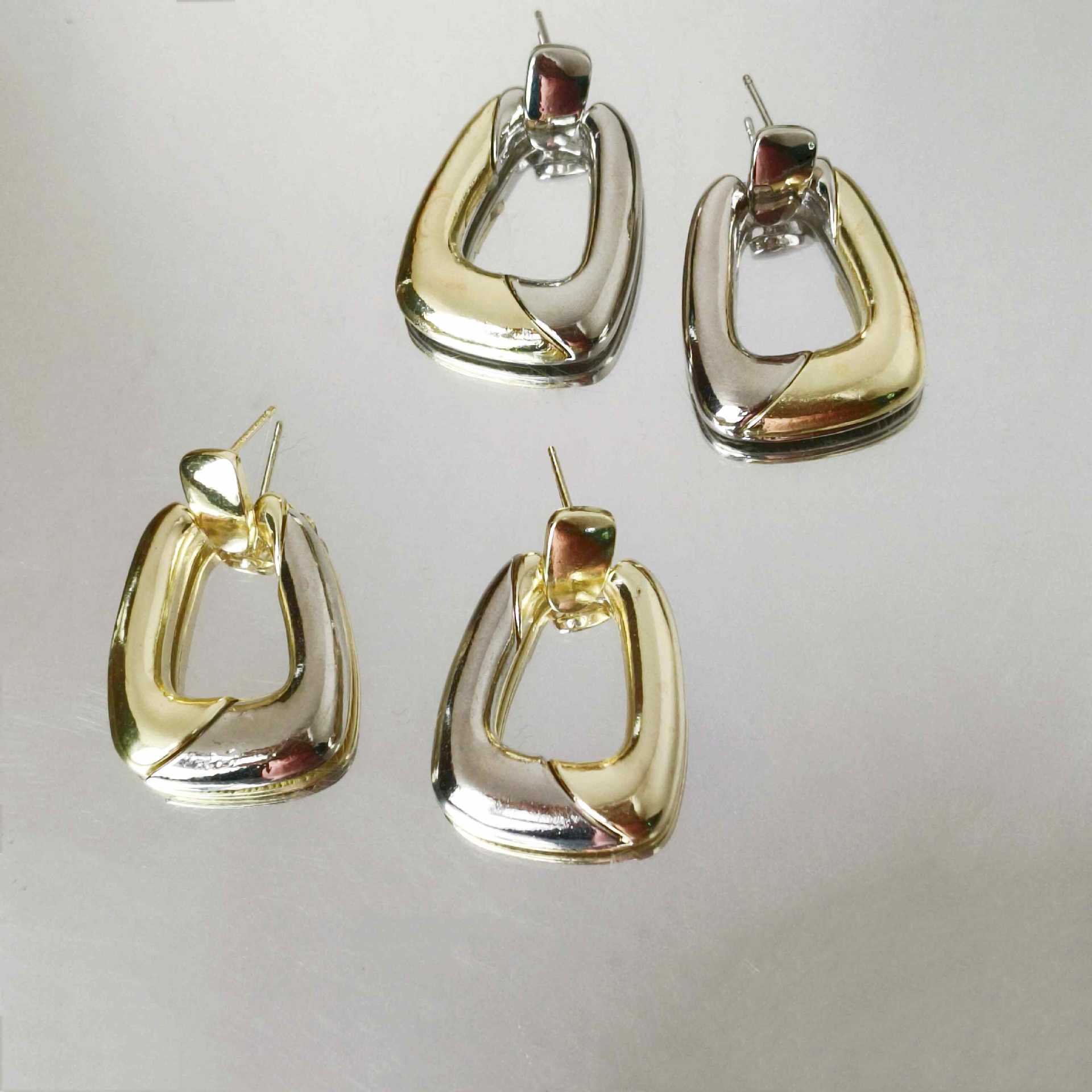 European and American metal two-tone earrings with unique personality, irregular geometric earrings, light luxury, high-end and cold style earrings for women full figure