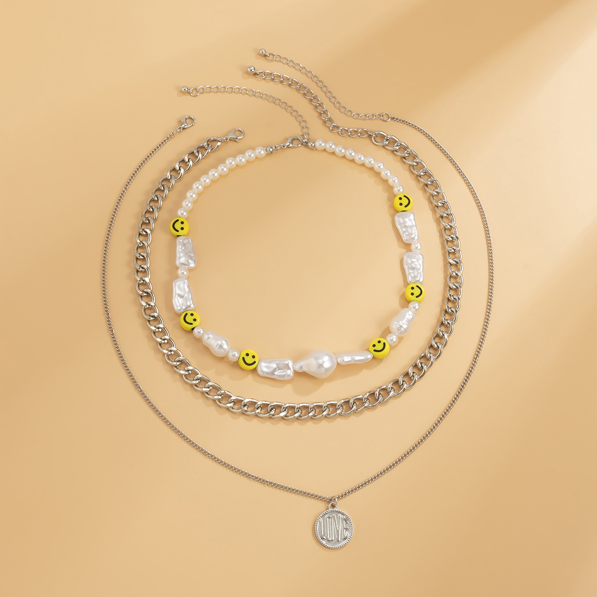 European and American cross-border jewelry, ethnic style spliced combination collarbone chain necklace, imitation pearl geometric smiling face letter necklace Application Scenario