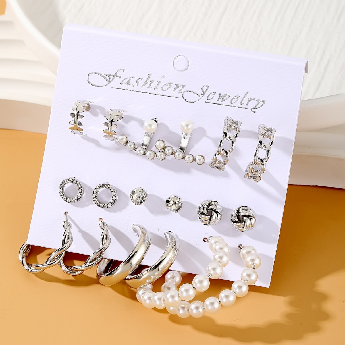 A new batch of 9-piece creative French retro gold earrings set with pearl inlays for cross-border women from Europe and America Specification drawing