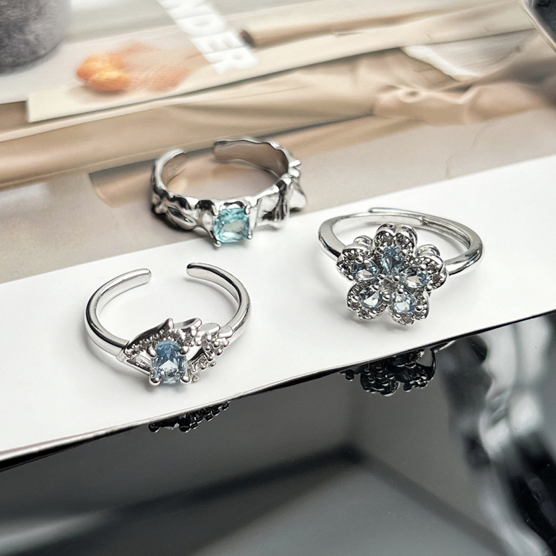 Korean version exquisite ice blue full diamond flower fashion ring, a cold and elegant female style, light luxury and high-end, sweet and cool stacked food ring Application Scenario
