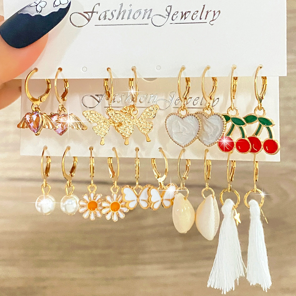 Wholesale of European and American cross-border accessories, fashionable tassel shell earrings, versatile for women's charm, diamond-encrusted cherry small butterfly stud earrings full figure