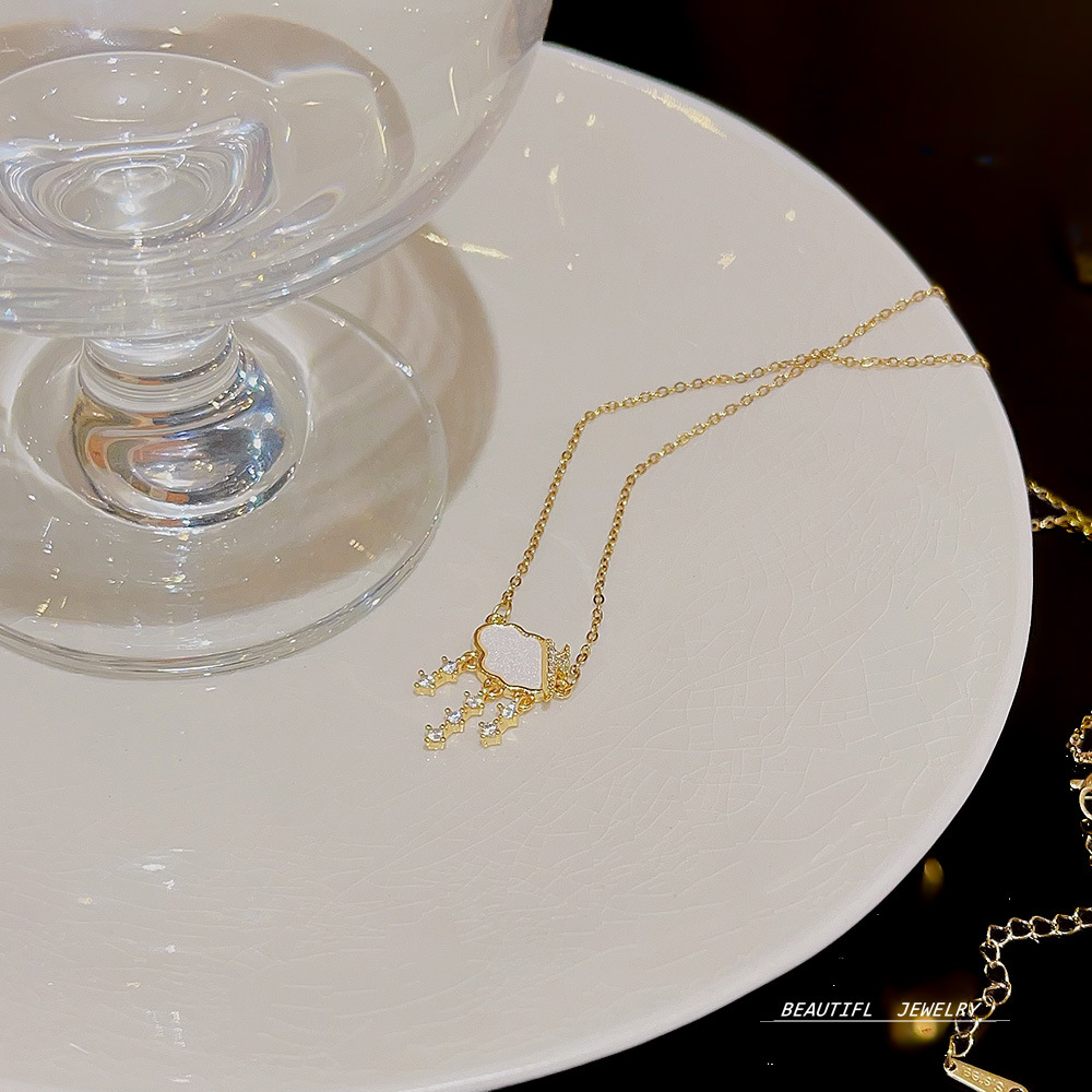 Wholesale of the new Korean internet-famous titanium steel necklace with a versatile design for women, cloud raindrop zircon pendant, collarbone chain and neck chain Application Scenario