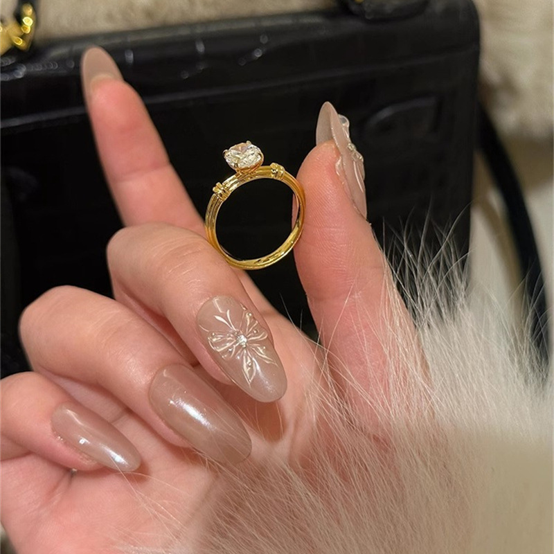s925 Silver Pigeon Egg Zircon knot ring, with a unique and niche design, is a light luxury, fashionable and exquisite ring for the index finger Item Picture