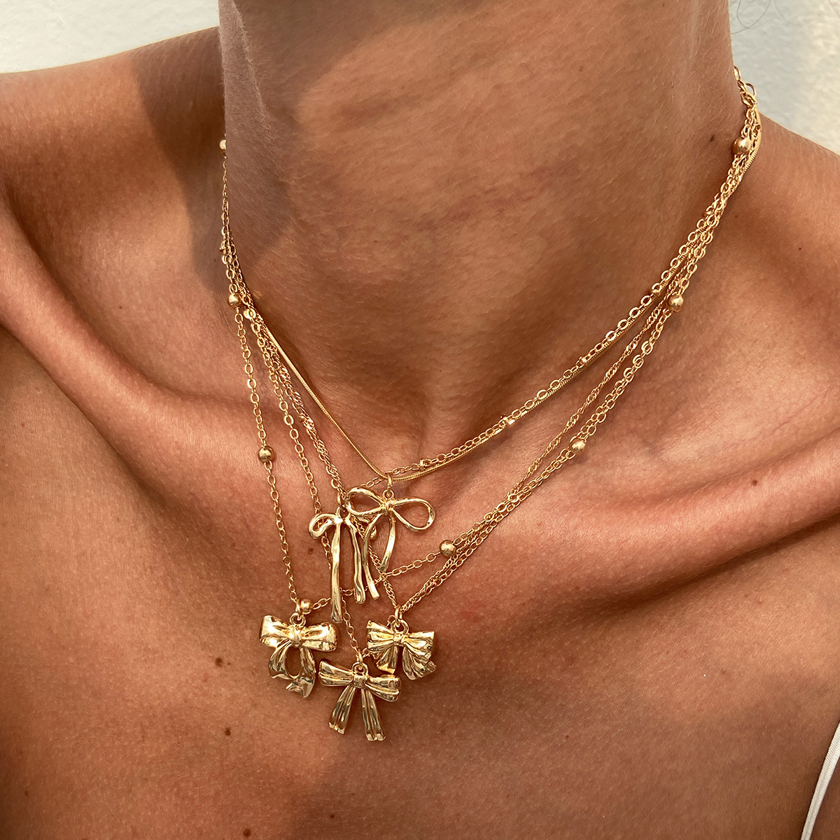 European and American cross-border accessories hip-hop style bow alloy pendant collarbone chain personality simple Necklace set Specification drawing