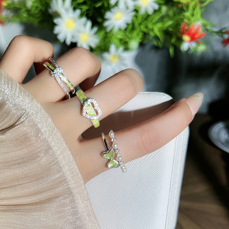 Fashionable and fresh light green enamel drop glaze heart-shaped bow double-layer pearl ring, a cold and unique index finger ring for women details Picture
