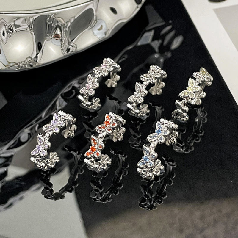 A high-end, super sparkling zircon butterfly ring for women on Instagram, with a cool, sweet and light luxury color diamond style. It's a popular adjustable ring full figure