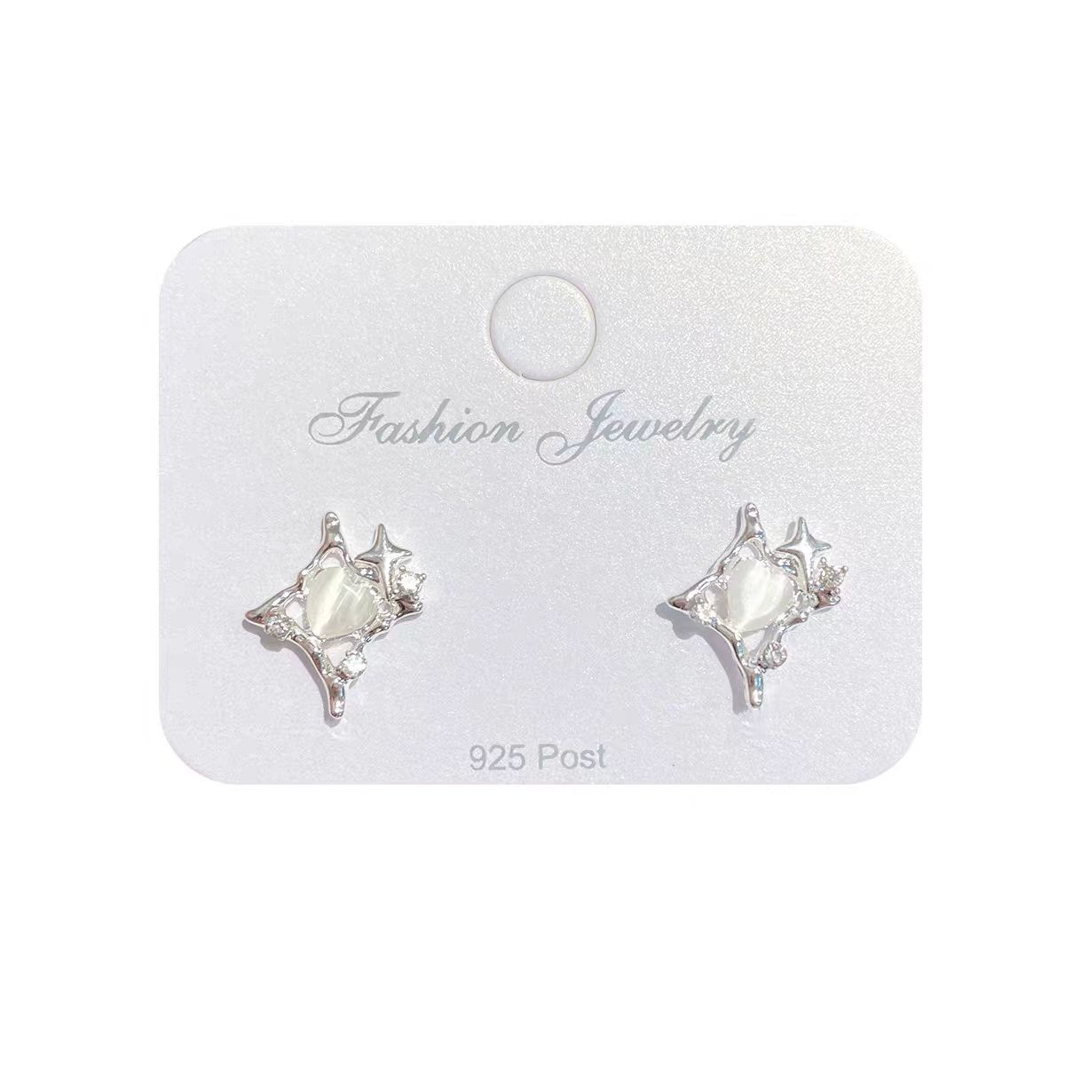 Shining heart-shaped cat's eye stone ear studs, women's niche style, design sense, star cold, wind level sense earrings and earrings Item Picture