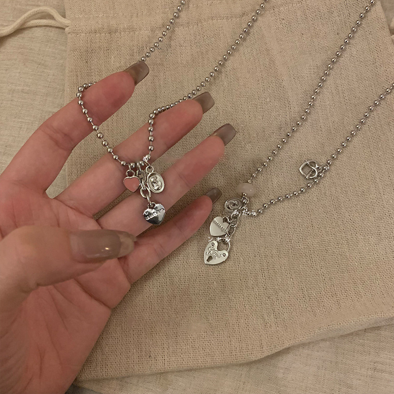 The new autumn and winter heart-shaped necklace is a simple and versatile accessory with a unique design for women. It features a collarbone chain and a sweet and cool hoodie chain full figure