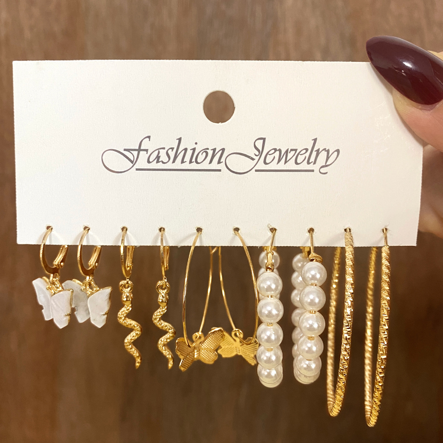 Korean jewelry World Cross-border alloy earring set with diamond stud earrings, creative and simple acrylic butterfly snake pendant 1266 details Picture